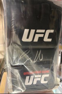 Conor McGregor signed UFC glove with Beckett sticker of authenticity