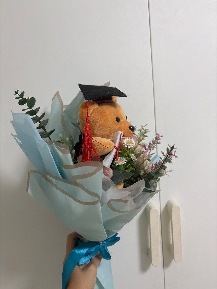 wts graduation plush bear bouquet (Category: Flowers & Bouquets) located in Singapore. Submitted by cryste (Listing ID 1345473636, Image 2). Description: item shown in pic, meetups only @ sembw shopping centre, mrt depends!.