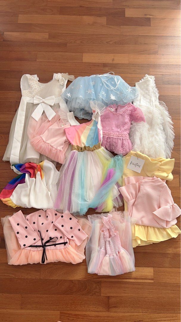 Almost New - party ruffle tulle rainbow mummy and me twinning girl dress (Category: Babies & Kids Fashion) located in Singapore. Submitted by shoppiemama (Listing ID 1346045954, Image 1). Description: Pic 2 Pastel top/dress w sequins 60cm length 4-6yo $8 Rainbow top 51cm length 3-6yo, straps adjustable SOLD Polka dot ruffle dress w black ribbon 58cm length 3-5yo (slight wear on dress) SOLD K Sisters BNWT yellow 52cm length tagged 3-4yo $15 K Sist