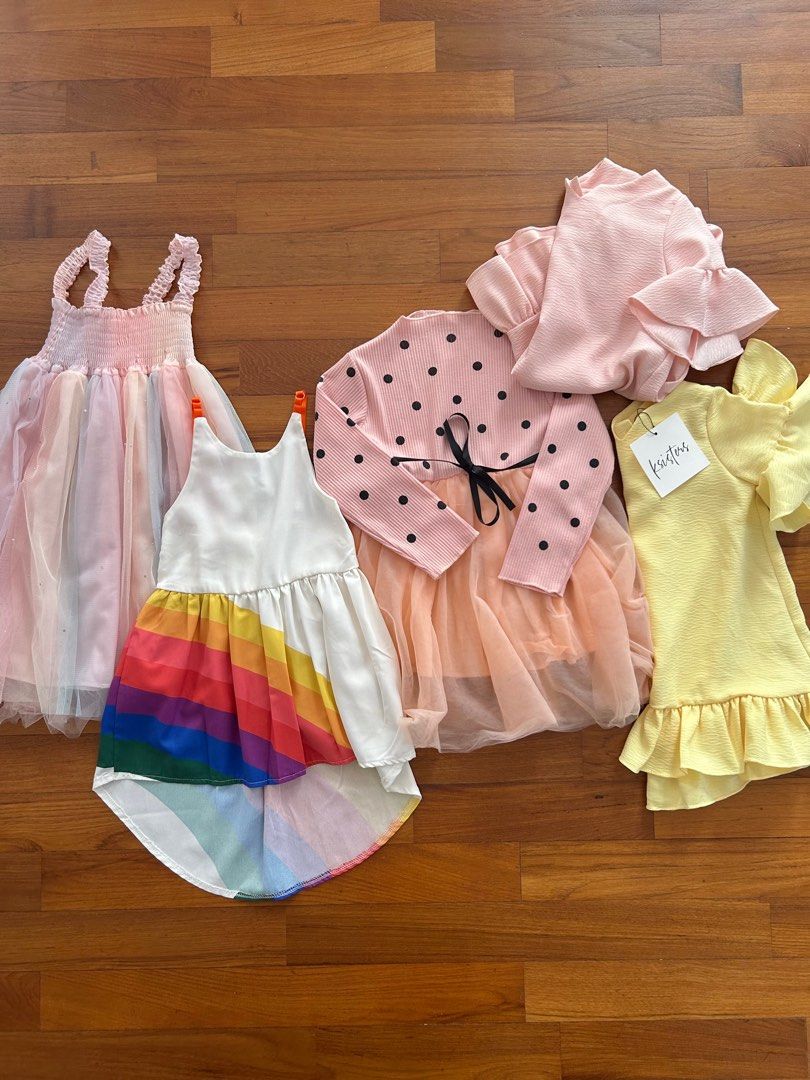 Almost New - party ruffle tulle rainbow mummy and me twinning girl dress (Category: Babies & Kids Fashion) located in Singapore. Submitted by shoppiemama (Listing ID 1346045954, Image 2). Description: Pic 2 Pastel top/dress w sequins 60cm length 4-6yo $8 Rainbow top 51cm length 3-6yo, straps adjustable SOLD Polka dot ruffle dress w black ribbon 58cm length 3-5yo (slight wear on dress) SOLD K Sisters BNWT yellow 52cm length tagged 3-4yo $15 K Sist
