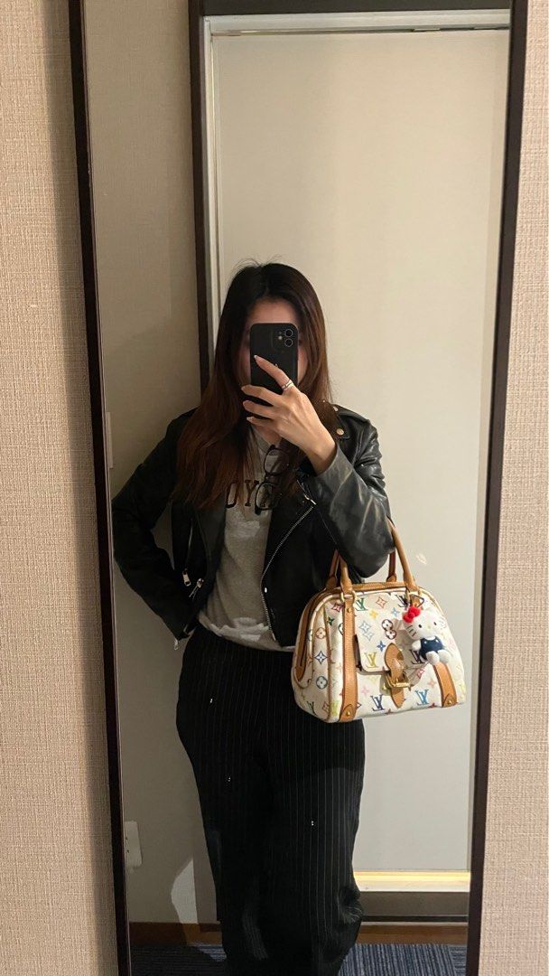 Louis Vuitton LV Murakami Multicolor Priscilla Handbag (Category: Bags & Wallets) located in Singapore. Submitted by icedmatchaa (Listing ID 1398320586, Image 3). Description: - Authentic Louis Vuitton Murakami Priscilla handbag - Features top handle and front pocket with buckle closure - Includes dust bag & verification cert - Some wear and tear, condition 7/10 - Selling as it’s not really my style so I don’t reach for it often Very Y2K ✨.