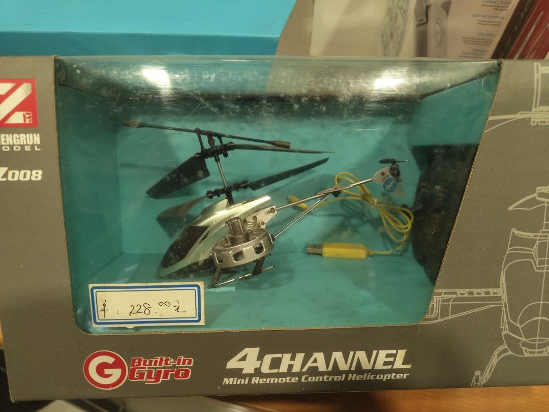 Remote helicopter x 2 - Zengrun Z008 4-Channel Mini RC Helicopter (Category: Remote Control Toys) located in Singapore. Submitted by striar (Listing ID 1396051827, Image 1). Description: - Zengrun Z008 mini remote control helicopter - 4-channel control system - Built-in gyroscope for stable flight - Suitable for beginners bought in China for 200~ yuan. Used to fly it in the house, but unsure of condition now. can take for parts or whole. includes