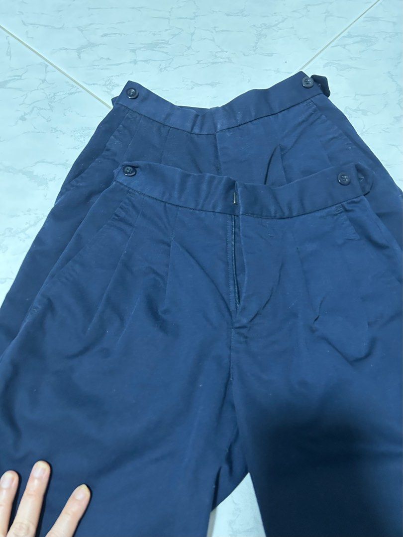 Boy’s School Uniform Pants/Shorts (Category: Shorts) located in Singapore. Submitted by littlehut99 (Listing ID 1400508346, Image 5). Description: - Boy’s school shorts - Size : S - Waist : 22-inch (can make it smaller by tightening the waist button on both sides) - Number : 2 pieces ( $8 per piece, $15 for two) - Good condition .