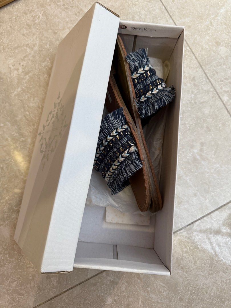 Denim Sandals (Category: Sandals) located in Singapore. Submitted by vantyw (Listing ID 1401044151, Image 1). Description: Pied a Terre denim sandals. Size 7. Denim design with fringe. Includes original box..