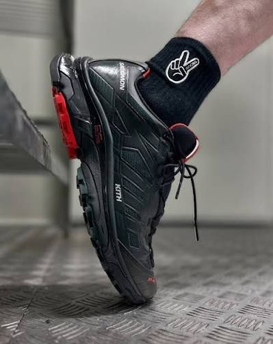 Kith x Salomon XT-4 "Kithmas Black" (Authentic) (Category: Sneakers) located in Singapore. Submitted by xuperman (Listing ID 1405109004, Image 8). Description: Brand : Salomon Item : XT-4 x Kith “Kithmas Black” SKU : L4777230032 Color : Black / Scarab / Fiery Red Size : UK9.5 / US10 / CM28 / EUR44 Price : $500 Condition : 10/10 (BNIB).
