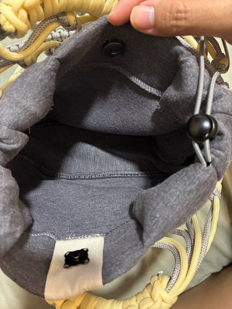 Tanchen X TEM Knot Bag in butter (Category: Shoulder Bags) located in Singapore. Submitted by bunnyhop22 (Listing ID 1401848747, Image 6). Description: Rtp $89 Barely used Selling to make space for new bags & decluttering before i move house.
