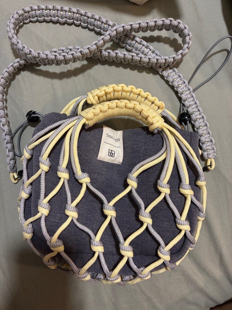 Tanchen X TEM Knot Bag in butter (Category: Shoulder Bags) located in Singapore. Submitted by bunnyhop22 (Listing ID 1401848747, Image 3). Description: Rtp $89 Barely used Selling to make space for new bags & decluttering before i move house.