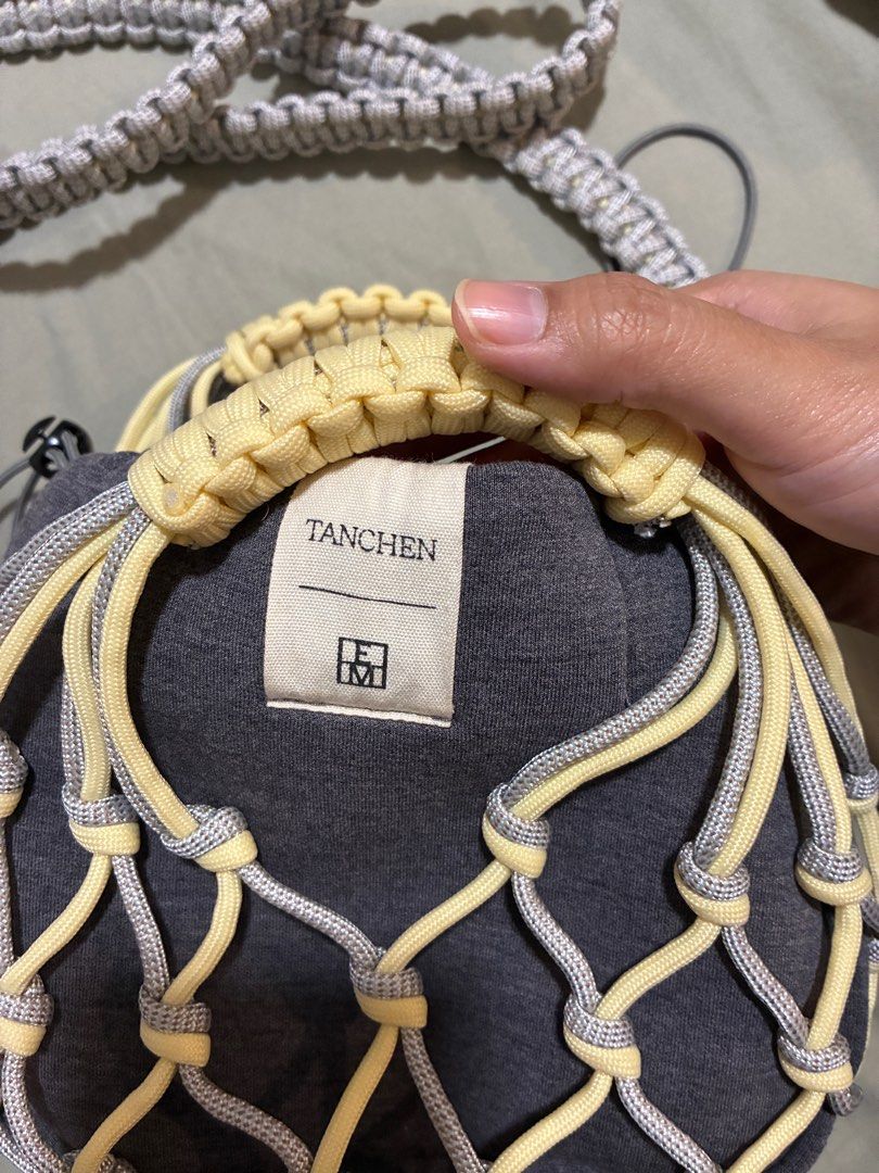 Tanchen X TEM Knot Bag in butter (Category: Shoulder Bags) located in Singapore. Submitted by bunnyhop22 (Listing ID 1401848747, Image 4). Description: Rtp $89 Barely used Selling to make space for new bags & decluttering before i move house.