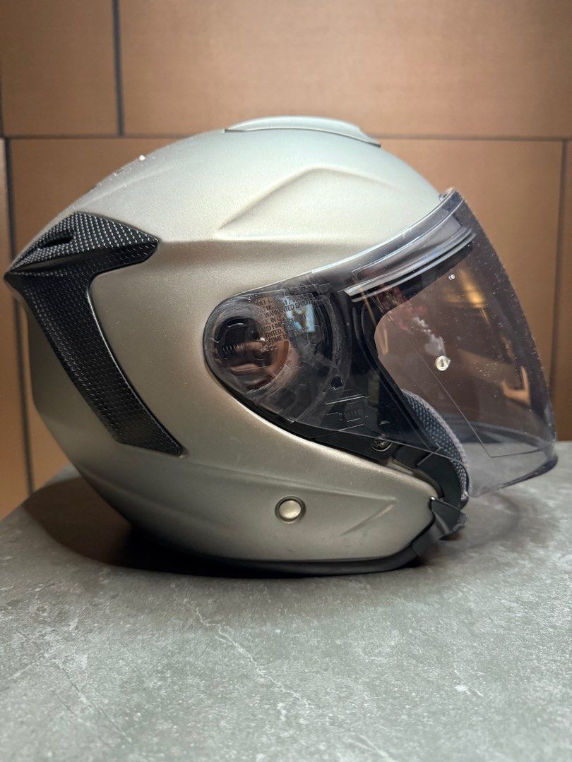 Shoei J Force IV, Size M (Category: Motorcycle Apparel) located in Singapore. Submitted by rookie.balboa.9 (Listing ID 1406664784, Image 4). Description: Shoei J Force IV Size- Medium Color- Gunmetal Matte Comes with Semi Smoke tinted Visor. Original Clear Visor also included. Helmet bag & box included. Condition- 8.5/10 Minor scratches at the sides. Selling at $388. Not interested in trade-ins. Low ballers can go n jump from 20th storey building