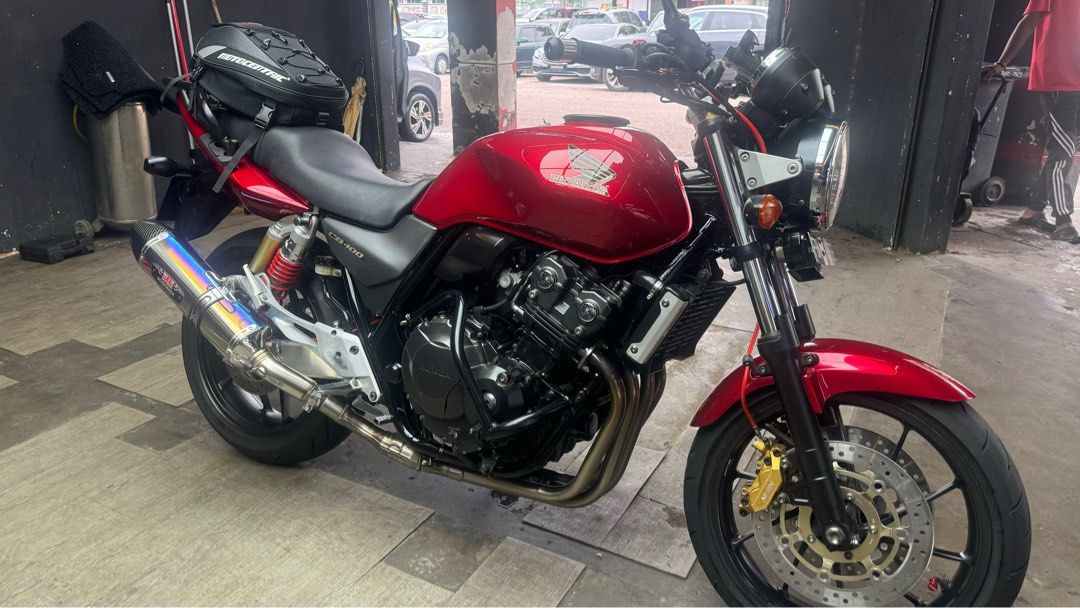 Yoshimura x Honda CB400 Super Four Revo (Category: Class 2A) located in Singapore. Submitted by t_5ky (Listing ID 1407287334, Image 2). Description: Hobbist motorcycle for sale Start Mileage - 72K Current Mileage - 75K COE - Nov 2027 End 2023 - New chain, new brake discs, new brake pads, new brake lines Registered Yoshimura Exhaust Nov 2025 - Renewed Road Tax Nov 2025 - Passed Inspection Full cash only .
