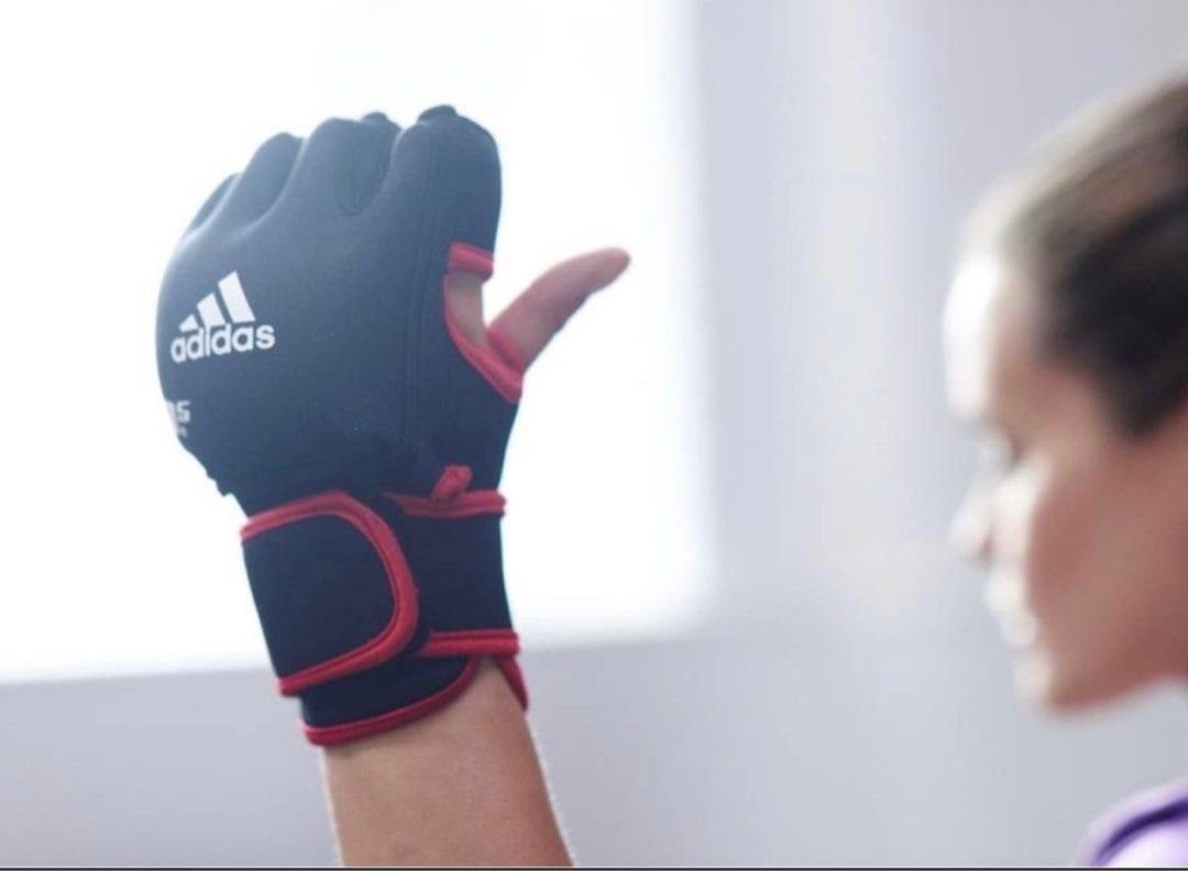 Weighted Gloves 2 x 0.5kgs Adidas for gym workout CrossFit (Category: Toning & Stretching Accessories) located in Singapore. Submitted by hebrew (Listing ID 1410479476, Image 2). Description: Selling brand new pair of Adidas performance gloves. Genuine product. Although Free Size, these gloves are perfect for slim to medium sized palms. Has velcro to tighten them up. Actual 1st photo shown of boxset. Ps. Not for super buff palms!.