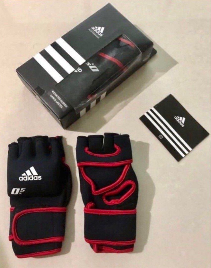 Weighted Gloves 2 x 0.5kgs Adidas for gym workout CrossFit (Category: Toning & Stretching Accessories) located in Singapore. Submitted by hebrew (Listing ID 1410479476, Image 1). Description: Selling brand new pair of Adidas performance gloves. Genuine product. Although Free Size, these gloves are perfect for slim to medium sized palms. Has velcro to tighten them up. Actual 1st photo shown of boxset. Ps. Not for super buff palms!.