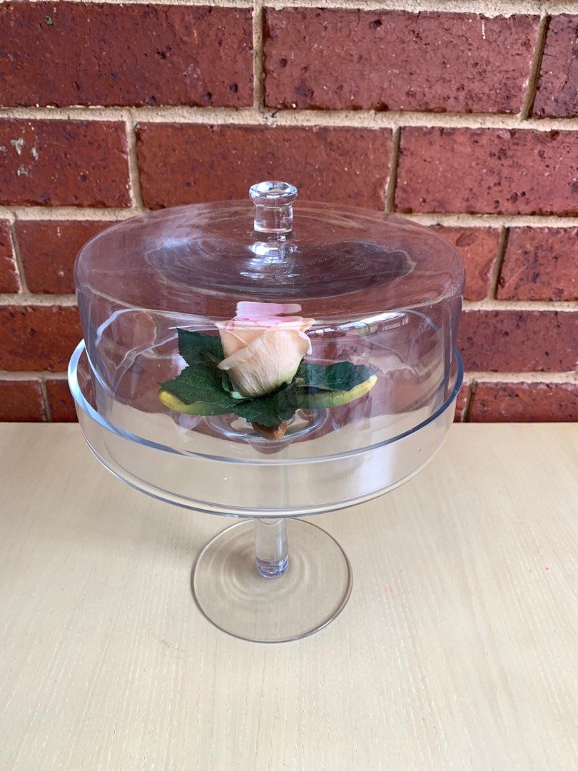 Clear Glass Cake Stand with Dome (Category: Bakeware) located in Singapore. Submitted by cottageloft (Listing ID 1411370061, Image 3). Description: Elegant clear glass cake stand with a dome cover. Perfect for displaying cakes, pastries, or decorative items. Features a sturdy base and a clear dome to protect your treats. Great for special occasions or everyday use. Flexible in pick-up location..