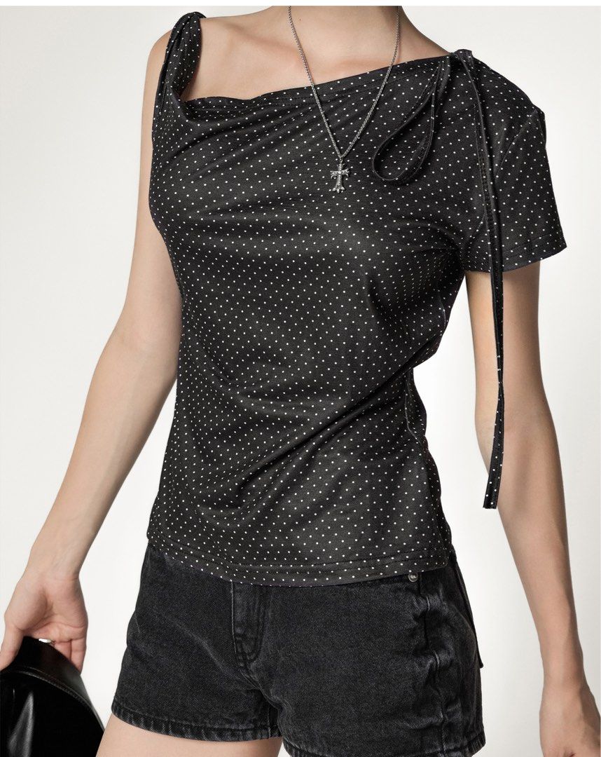 wts BN y2k black polka dot white design off shoulder cap sleeve flattering top (Category: Blouses) located in Singapore. Submitted by cryste (Listing ID 1411586411, Image 3). Description: can be worn in many ways, off shoulder w choker or to shorten the sleeves etc! up to ur preference! 🍀 flattering, stylish, and comfortable; perfect to wear or gift for birthdays/christmas/white elephant/secret santa!! - will not provide further pics/measurement