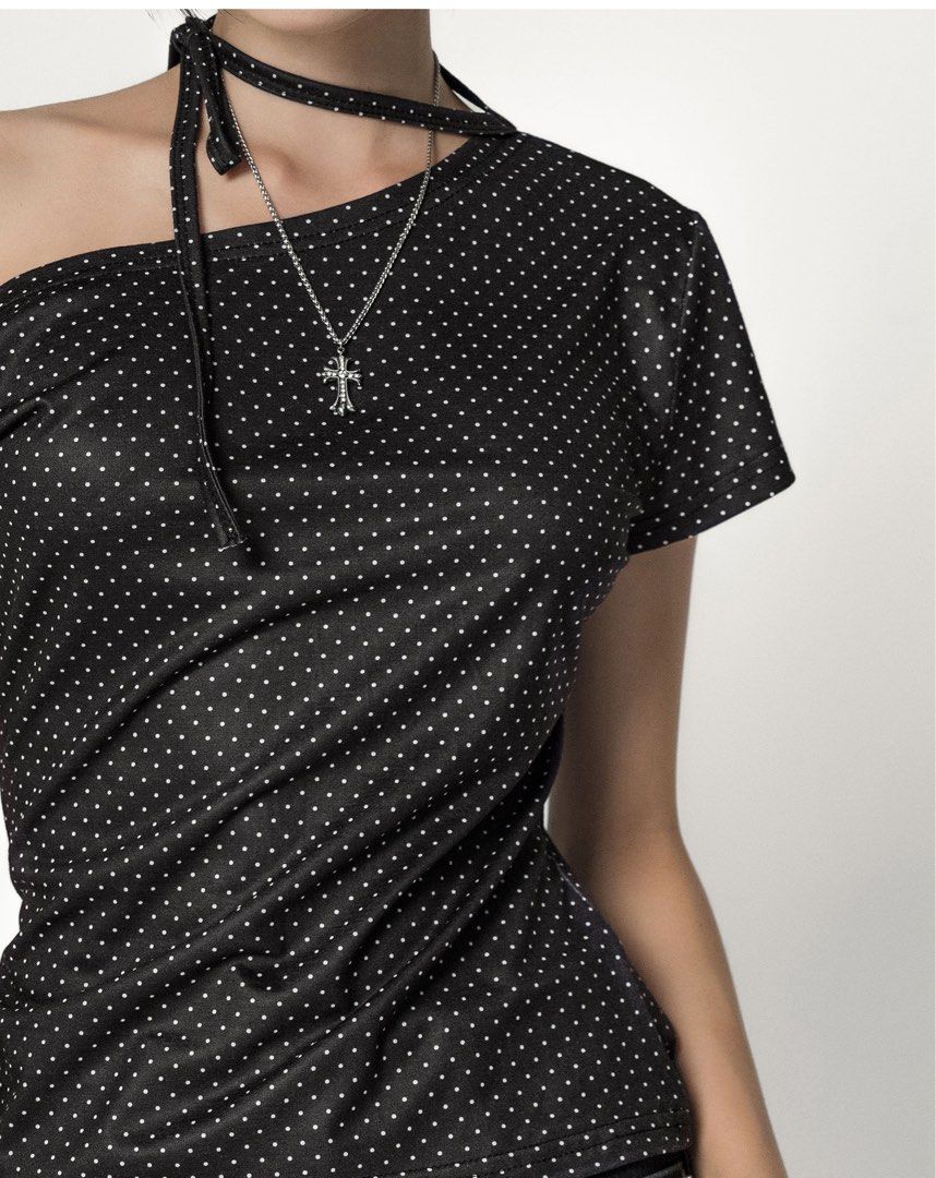 wts BN y2k black polka dot white design off shoulder cap sleeve flattering top (Category: Blouses) located in Singapore. Submitted by cryste (Listing ID 1411586411, Image 2). Description: can be worn in many ways, off shoulder w choker or to shorten the sleeves etc! up to ur preference! 🍀 flattering, stylish, and comfortable; perfect to wear or gift for birthdays/christmas/white elephant/secret santa!! - will not provide further pics/measurement