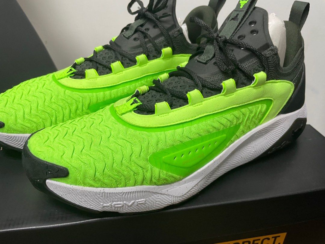 Under Armour Project Rock 7 Training Shoes us size 14 with box (Category: Sneakers) located in Singapore. Submitted by samyjessie2017 (Listing ID 1412007882, Image 2). Description: - Under Armour Project Rock 7 training shoes - Neon green and black color scheme - Features The Rock's Brahma Bull logo - Unworn condition - Comes with original box - Ideal for gym workouts and casual wear - used once only - as good as new with boxes and all Can negoti