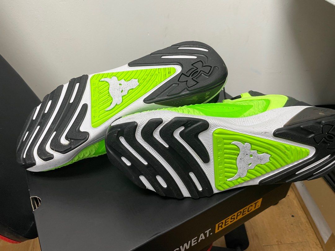 Under Armour Project Rock 7 Training Shoes us size 14 with box (Category: Sneakers) located in Singapore. Submitted by samyjessie2017 (Listing ID 1412007882, Image 6). Description: - Under Armour Project Rock 7 training shoes - Neon green and black color scheme - Features The Rock's Brahma Bull logo - Unworn condition - Comes with original box - Ideal for gym workouts and casual wear - used once only - as good as new with boxes and all Can negoti