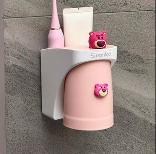 toothbrush / toothpaste holder