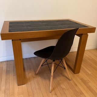 Solid wooden table with leather top