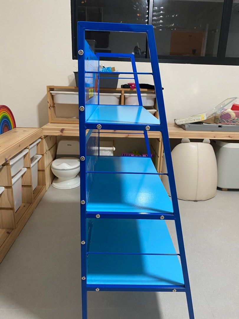 Kids / Children Bookshelf (Category: Shelves, Cabinets & Racks) located in Singapore. Submitted by thematicah (Listing ID 1361480103, Image 3). Description: Almost brand new. Fixed up the shelf but later realised that we have more books to fit. Item is made from metal and is relatively heavy. Dimensions: 59x40x100cm Bookshelf will not be dismantled, please collect as it is. .