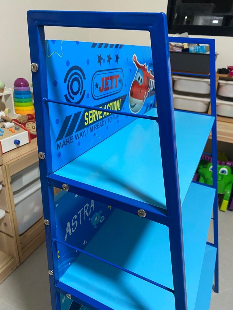Kids / Children Bookshelf (Category: Shelves, Cabinets & Racks) located in Singapore. Submitted by thematicah (Listing ID 1361480103, Image 2). Description: Almost brand new. Fixed up the shelf but later realised that we have more books to fit. Item is made from metal and is relatively heavy. Dimensions: 59x40x100cm Bookshelf will not be dismantled, please collect as it is. .