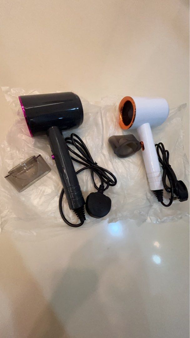 Hair Dryer (Category: Hair) located in Singapore. Submitted by tinyminimart (Listing ID 1362817891, Image 1). Description: lightweight yet powerful hairdryer! It’s easy to carry, works well, and is perfect for everyday use and especially for travels. However, please manage expectations—this isn’t a high-end salon-quality dryer.