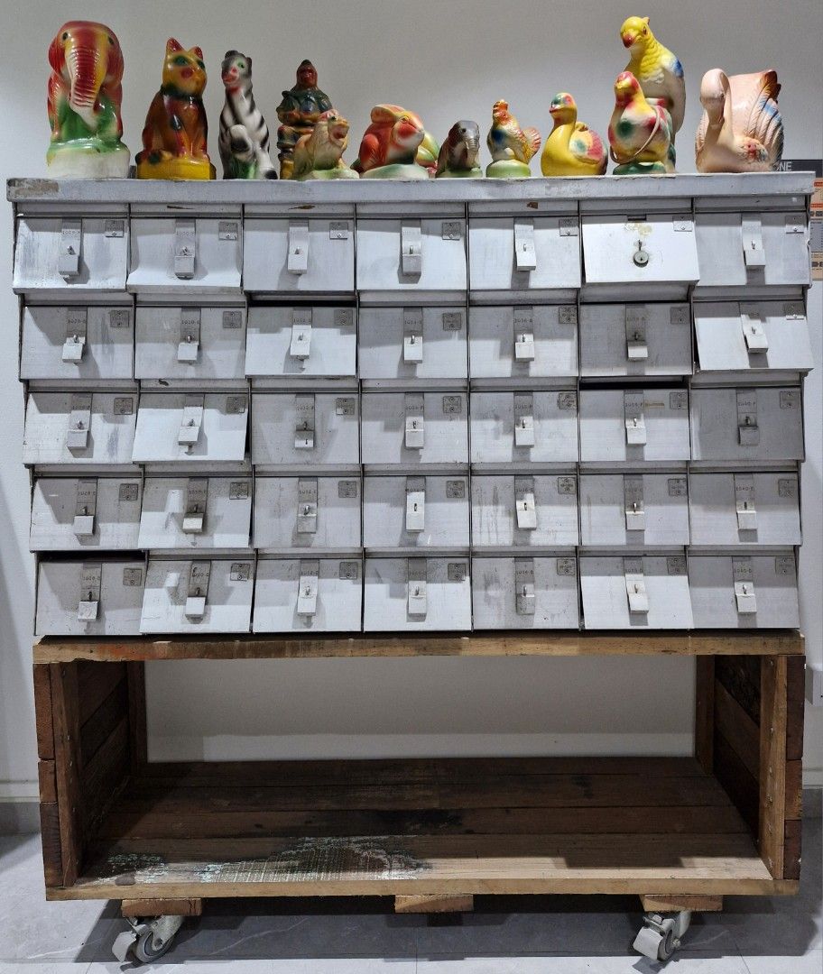Vintage HDB Letter Box (Category: Vintage Collectibles) located in Singapore. Submitted by creative_ks (Listing ID 1369107290, Image 1). Description: 1360mm X 430mm(D) X 1455mm (Ht) 830mm (Ht) of the letter box 630mm (Ht) of the bottom wooden stand. Sincere Negotiable (No hurry to let go) Collector's Item Buyer need to arrange mover. HDB Letterbox 35 units - total 3 units - locks but can ask locksmith to unlock. The letterboxes are together and p