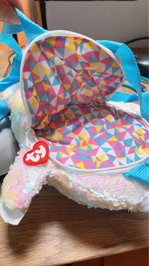 BNWT TY Sequin Winter Seal Bag Backpack Plush Plushie (Category: Babies & Kids Fashion) located in Singapore. Submitted by shoppiemama (Listing ID 1372112097, Image 4). Description: Super cute, brand new with tag. Bought for the girl but she ended up having way too many bags. Sequins are super pretty! $2 mail or meet up at Buona Vista, Caldecott, Queenstown weekdays. .