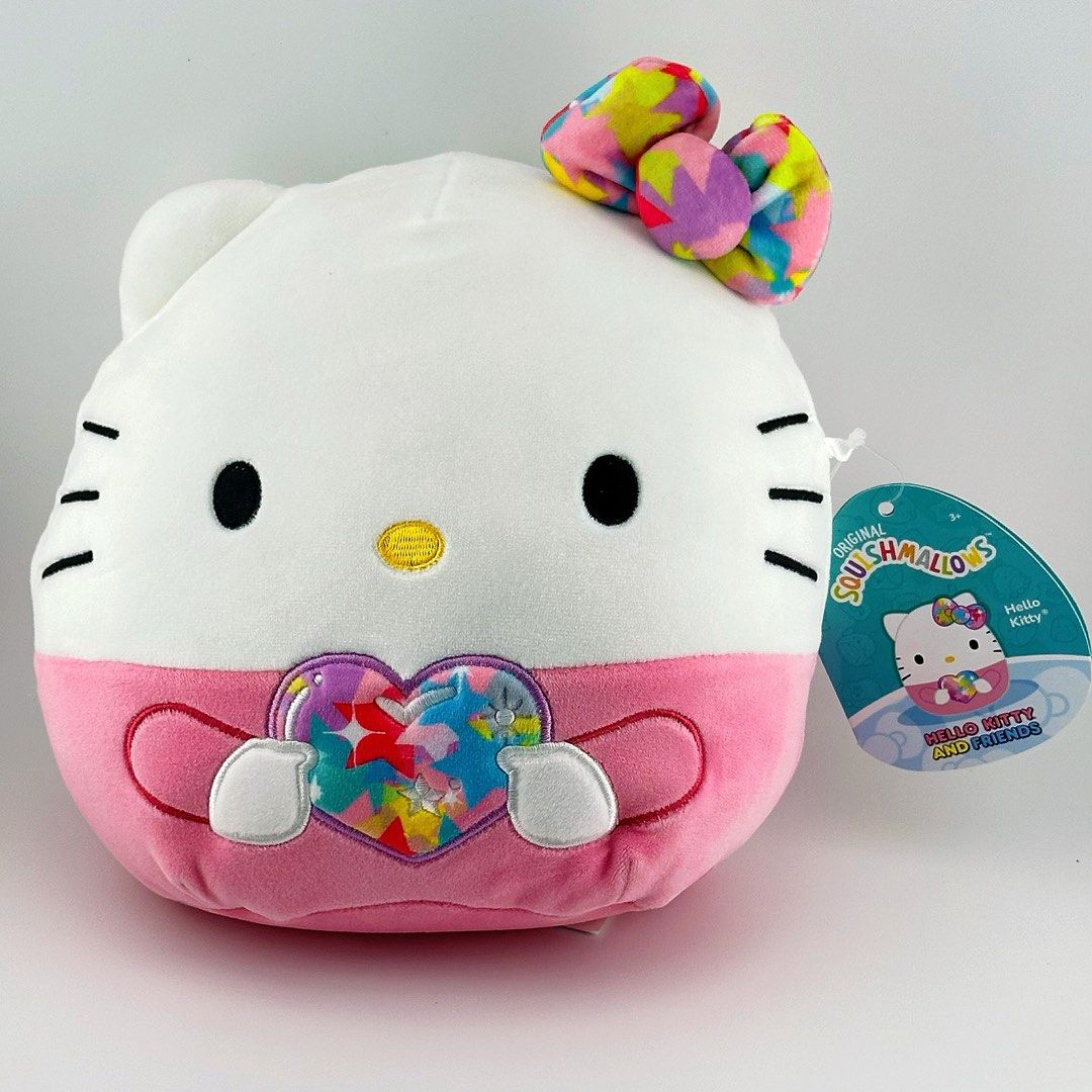 BRAND NEW with Tags Original Squishmallows Sanrio Plush Starshine Hello Kitty Holding Rainbow Heart 25cm (Category: Plushies & Soft Toys) located in Singapore. Submitted by abegoods (Listing ID 1373878467, Image 1). Description: KEY FEATURES 🌈Grow your Squish Squad with the Squishmallows Starshine Hello Kitty plush 🌈Made with ultrasoft, high-quality material 🌈The perfect cuddly companion 🌈Official Squishmallows and Sanrio product 🦄Contents: 