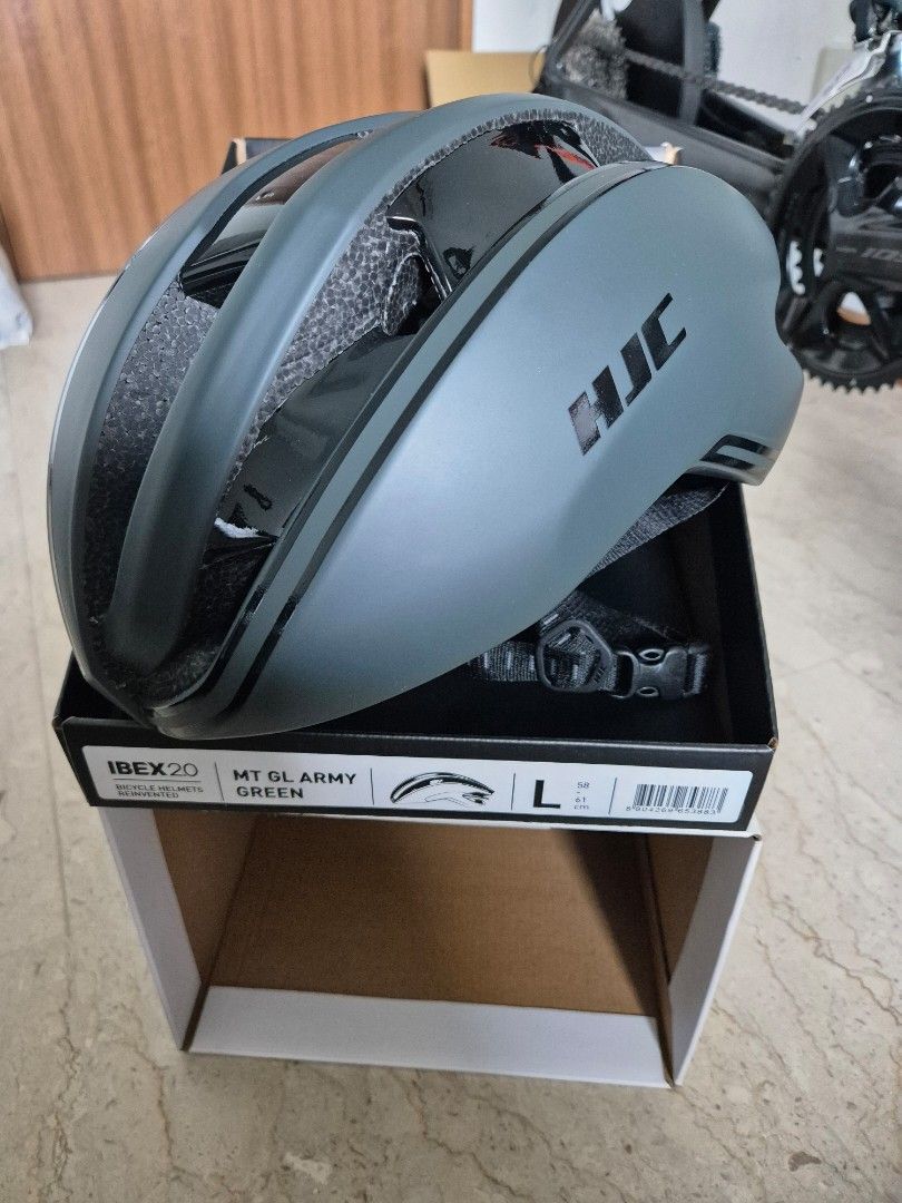 HJC Ibex 2.0 Bicycle Helmet - Army Green - Size L (Category: Parts & Accessories) located in Singapore. Submitted by jien_23 (Listing ID 1380149627, Image 4). Description: - Brand new HJC Ibex 2.0 road helmet - Army Green color - Size: L - Includes original box and carrying bag - Never been used Selling this new helmet that I bought just last week from Entro cycles. Only tried on, haven't ridden with it. Selling as it doesnt fit me well. Bought f