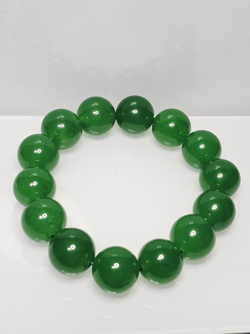Natural Myanmar Grade A Imperial Green Jadeite 缅甸帝王绿冰种翡翠, 15++ to 16mm, 76 Grams 14 Beads Stretchable Bracelet (B2008) [3] (Category: Bracelets) located in Singapore. Submitted by saynotofakes (Listing ID 1383065053, Image 3). Description: Stone : Myanmar Grade A Imperial Green Jadeite 缅甸帝王绿冰种翡翠 Diameter per bead : 15++ to 16mm (Approx.) Number of Beads : 14 Beads Weight : 76 Grams $688 Per Piece .