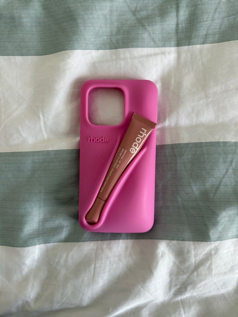 Rhode iPhone 14 Pro Case in Shortcake & Lip tint (toast) (Category: Cases & Sleeves) located in Singapore. Submitted by strawberryf4rt (Listing ID 1382914106, Image 7). Description: Selling Rhode Shortcake Iphone 14 Pro Case (changed my phone) Bought this from another seller who bought it in the US Lip Peptide in Toast included (brand new unused, just opened the box for show) - bought through tele which buys from the site itself Lip Tint toast - 