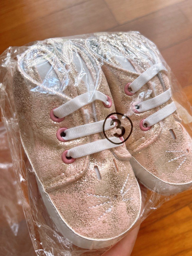 Soft sole shoes booties for 6-18months (Category: Babies & Kids Fashion) located in Singapore. Submitted by shoppiemama (Listing ID 1379575506, Image 2). Description: All brand new, not used but kept awhile. Blue $2 - very good sole but front has signs of being kept. White $3 - super pretty crochet shoes, bit of stain from being kept. Silver w straps (hard sole)$4 - soles a bit of signs being kept but otherwise perfect, doesn’t affect wearing or 