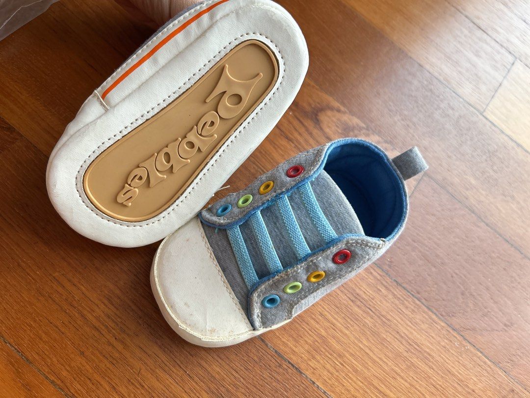 Soft sole shoes booties for 6-18months (Category: Babies & Kids Fashion) located in Singapore. Submitted by shoppiemama (Listing ID 1379575506, Image 5). Description: All brand new, not used but kept awhile. Blue $2 - very good sole but front has signs of being kept. White $3 - super pretty crochet shoes, bit of stain from being kept. Silver w straps (hard sole)$4 - soles a bit of signs being kept but otherwise perfect, doesn’t affect wearing or 