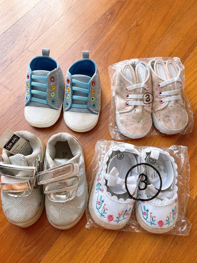 Soft sole shoes booties for 6-18months (Category: Babies & Kids Fashion) located in Singapore. Submitted by shoppiemama (Listing ID 1379575506, Image 1). Description: All brand new, not used but kept awhile. Blue $2 - very good sole but front has signs of being kept. White $3 - super pretty crochet shoes, bit of stain from being kept. Silver w straps (hard sole)$4 - soles a bit of signs being kept but otherwise perfect, doesn’t affect wearing or 
