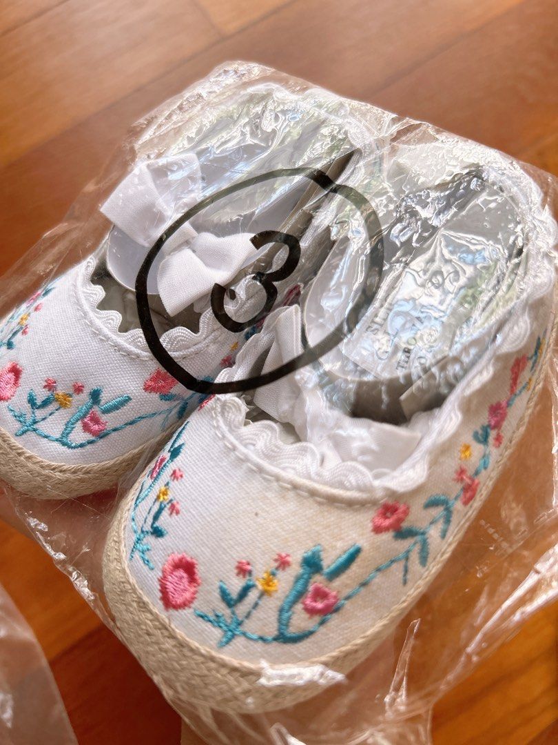 Soft sole shoes booties for 6-18months (Category: Babies & Kids Fashion) located in Singapore. Submitted by shoppiemama (Listing ID 1379575506, Image 3). Description: All brand new, not used but kept awhile. Blue $2 - very good sole but front has signs of being kept. White $3 - super pretty crochet shoes, bit of stain from being kept. Silver w straps (hard sole)$4 - soles a bit of signs being kept but otherwise perfect, doesn’t affect wearing or 