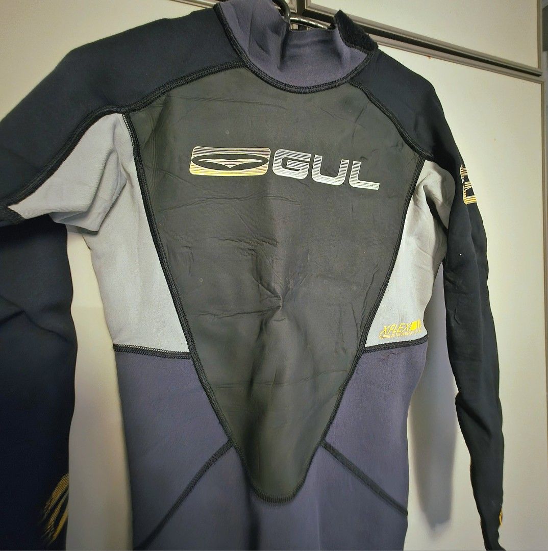 GUL Wetsuit for diving snorkeling watersports (Category: Water Sports) located in Singapore. Submitted by lelongahhh (Listing ID 1386359836, Image 2). Description: - Used GUL wetsuit for sale - Suitable for diving, watersports - Size: Medium-Small (Up to 172cm) - Used with signs of wear as per photo, hence selling cheap. - What you see is what you get.