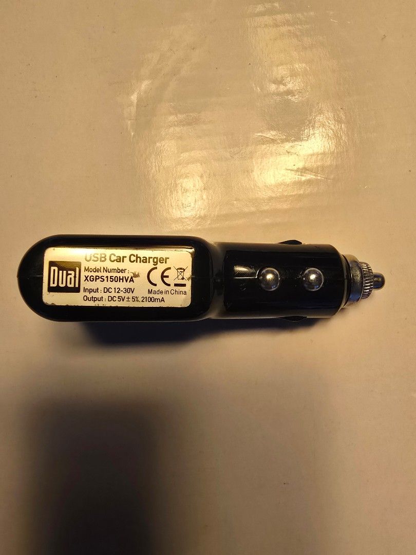 Dual USB Car Charger & Black Headphones (Category: Other Electronics) located in Singapore. Submitted by jmwei (Listing ID 1389927236, Image 1). Description: - Dual USB car charger in good working condition. - Black headphones in good condition. - Perfect for daily use..
