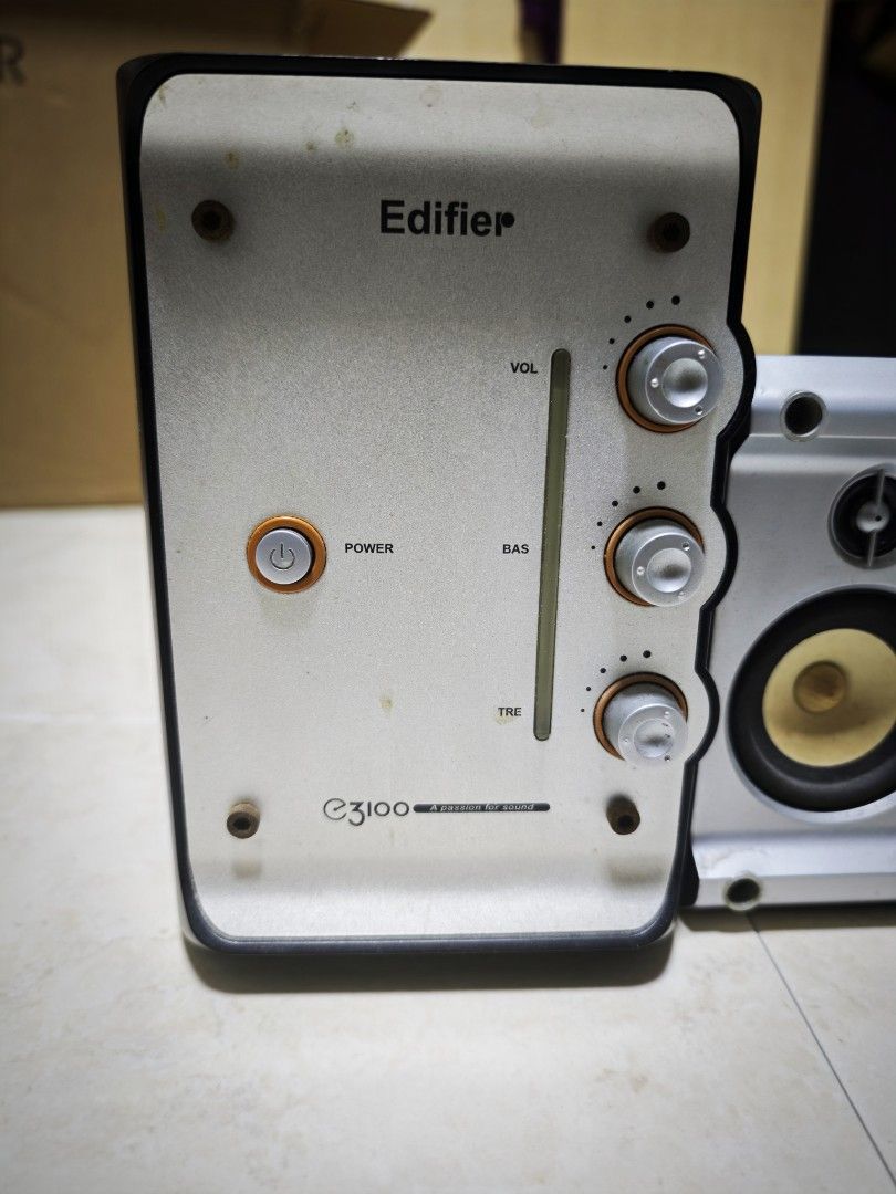 Edifier E3100 2.1 Multimedia Speaker System (Category: Soundbars, Speakers & Amplifiers) located in Singapore. Submitted by pennywisesmile (Listing ID 1392926969, Image 2). Description: - Edifier E3100 2.1 speaker system - Volume, bass, and treble controls - Power button - Stylish silver and black design - Perfect for desktop audio - Tested and fully functional - What you see is what you get - Not for fussy buyers.