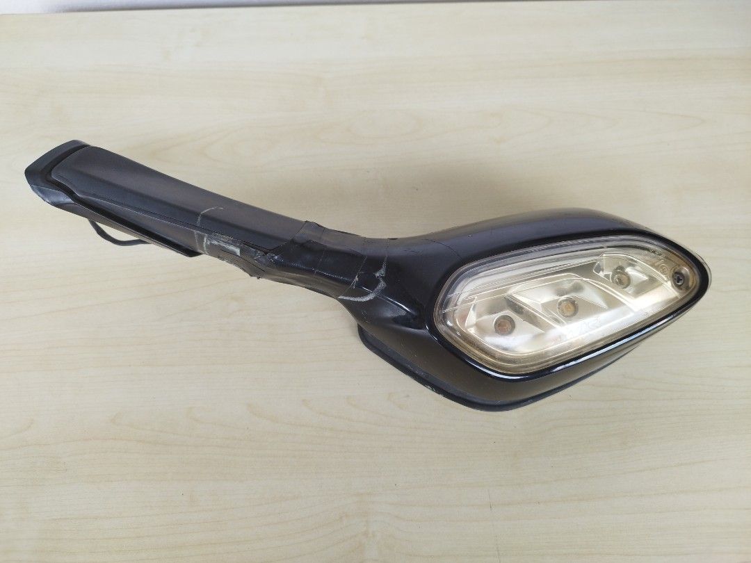SYM joymax 300i right side mirror (Category: Motorcycle Accessories) located in Singapore. Submitted by sure_sell (Listing ID 1393337080, Image 1). Description: - Used motorcycle mirror - Integrated turn signal - Black color - Clear turn signal lens - Wiring included - Please view photos for condition..