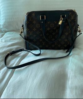 Like new authentic Louis Vuitton Retiro Monogram Noir top handle or crossbody sling bag