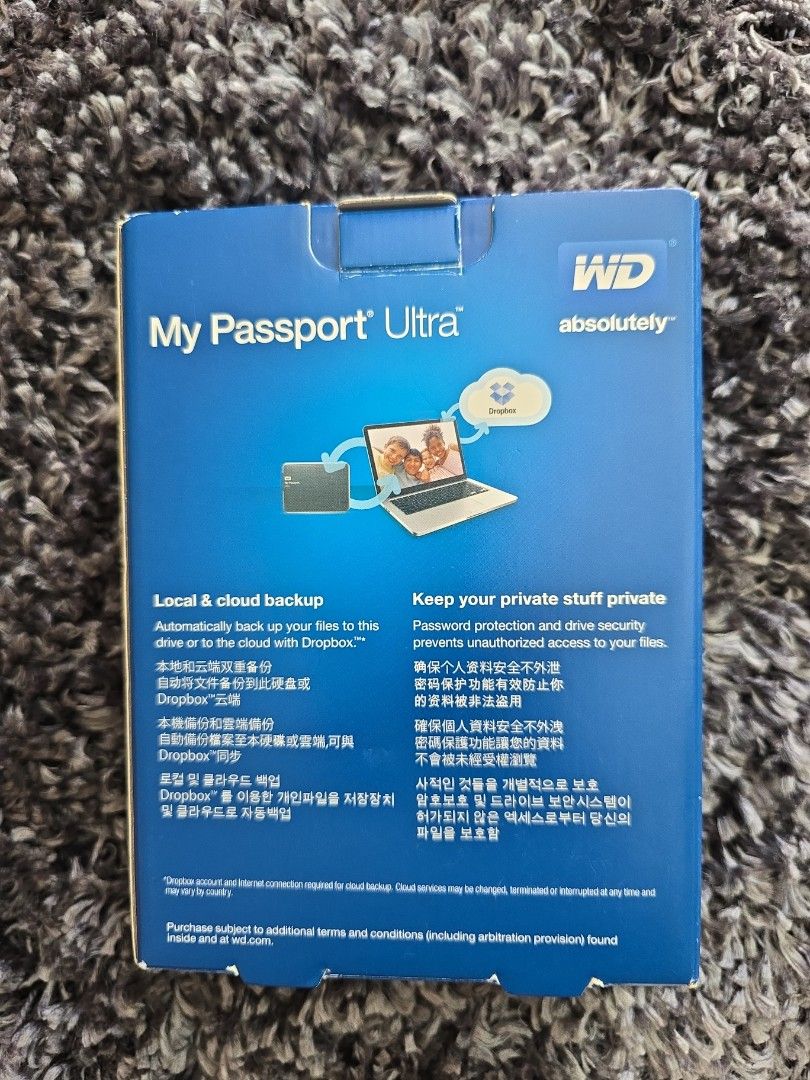 WD My Passport Ultra 1TB External Hard Drive (Category: Hard Disks & Thumbdrives) located in Singapore. Submitted by hardware3 (Listing ID 1391006855, Image 2). Description: - Brand new WD My Passport Ultra 1TB external hard drive - Automatic backup - Password protection for security - Dropbox cloud service integration - 3-year limited warranty - Perfect for backing up your files.