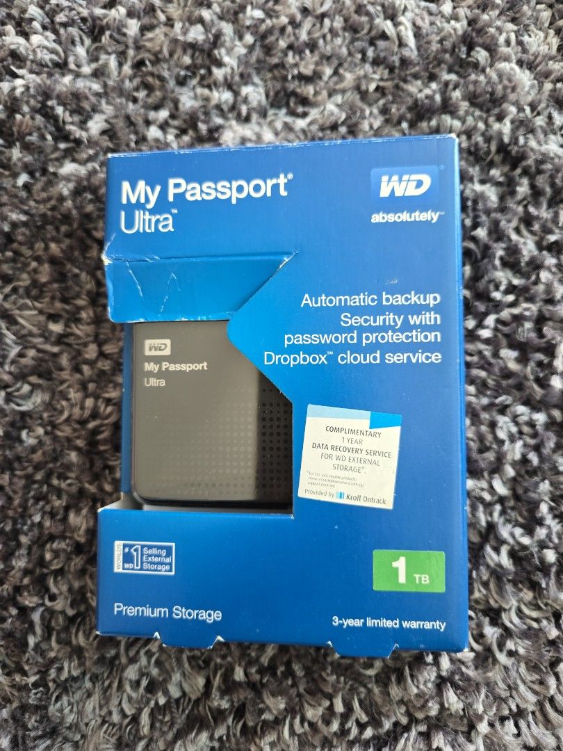 WD My Passport Ultra 1TB External Hard Drive (Category: Hard Disks & Thumbdrives) located in Singapore. Submitted by hardware3 (Listing ID 1391006855, Image 1). Description: - Brand new WD My Passport Ultra 1TB external hard drive - Automatic backup - Password protection for security - Dropbox cloud service integration - 3-year limited warranty - Perfect for backing up your files.