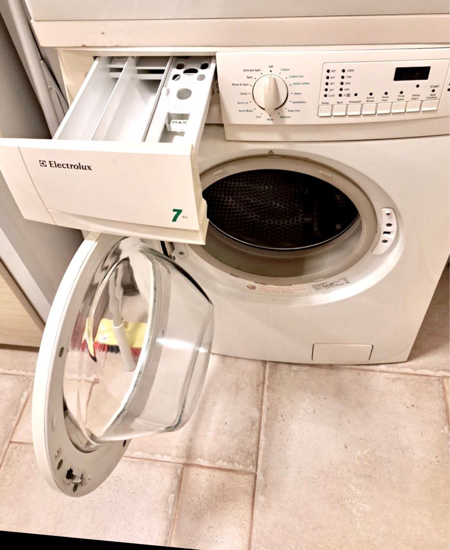 Urgent sale! Electrolux Washing Machine / Dryer stacked set ( 7 kg / 5 kg ) (Category: Washing Machines and Dryers) located in Singapore. Submitted by hebrew (Listing ID 1391387184, Image 2). Description: Fully functioning. No issues. Capacity: Washer - 7kg Dryer (vented type) - 5kg Dryer flexible tube is still in good condition. Pick up from Serangoon Ave 1, 550408..