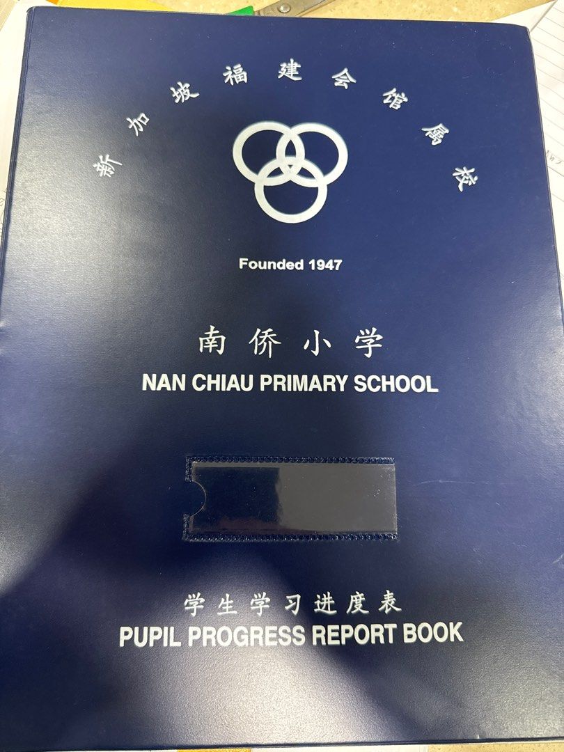 Nan Chiau Primary School Pupil Progress Report Book (Category: Textbooks) located in Singapore. Submitted by coolwolf_d167eb (Listing ID 1414933226, Image 1). Description: - Nan Chiau Primary School report book. - Minor marks on plastic sleeves. Transferred.