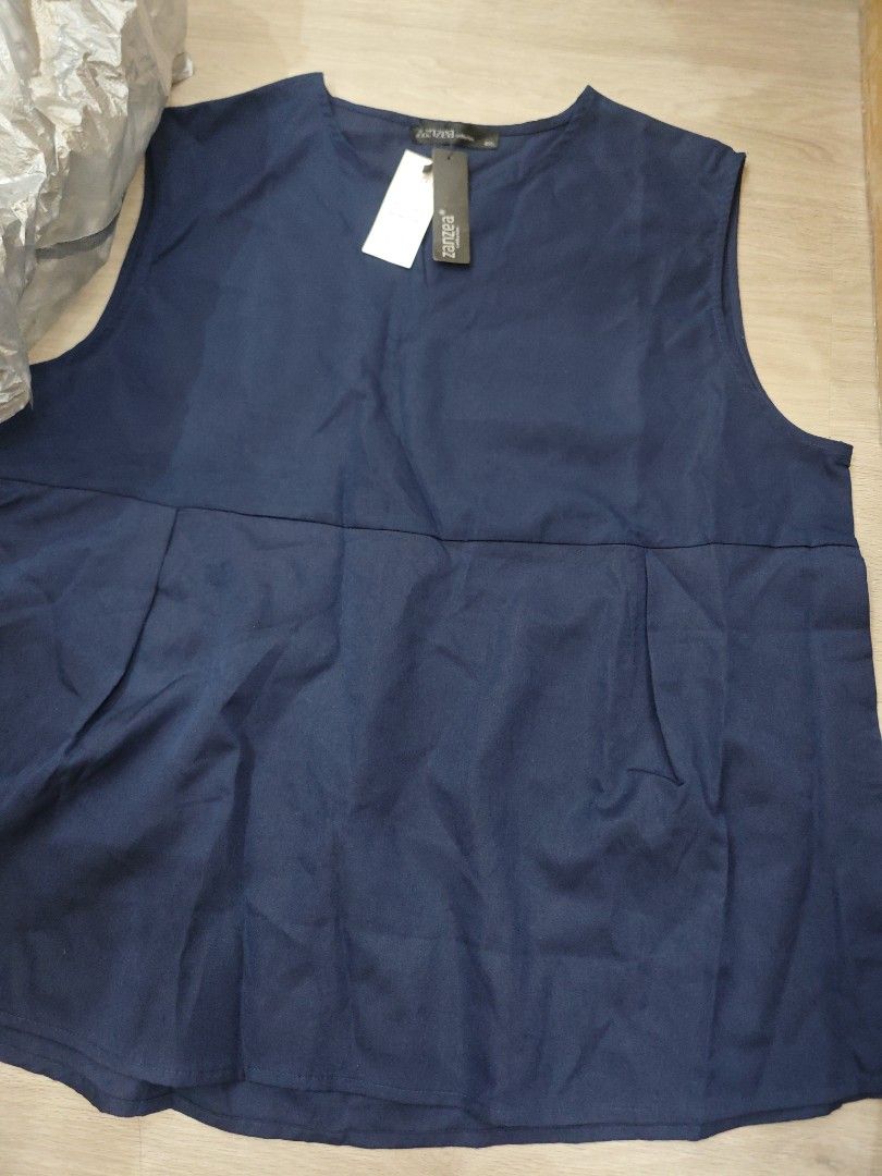 4XL dark blue top shirt (Category: Blouses) located in Singapore. Submitted by individual.supply (Listing ID 1416032921, Image 1). Description: Brand new with tag 4XL Includes free normal mail, mailing proof photo will be provided.
