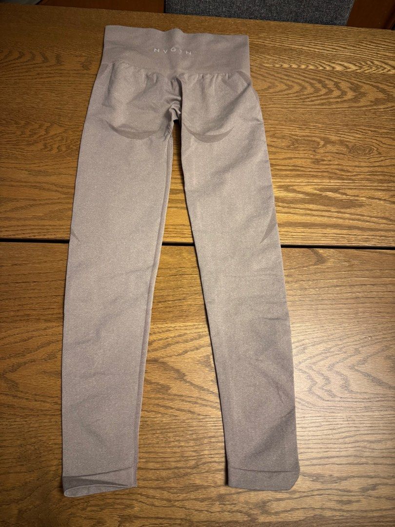 NVGTN Contour Seamless Leggings - Taupe (Category: Activewear) located in Singapore. Submitted by sarjo495 (Listing ID 1416367634, Image 2). Description: - NVGTN contour seamless leggings - Never worn, bought wrong size - Taupe color Same leggings in beige: https://nvgtn.com/collections/contour-seamless-leggings/products/beige-contour-seamless-leggings.