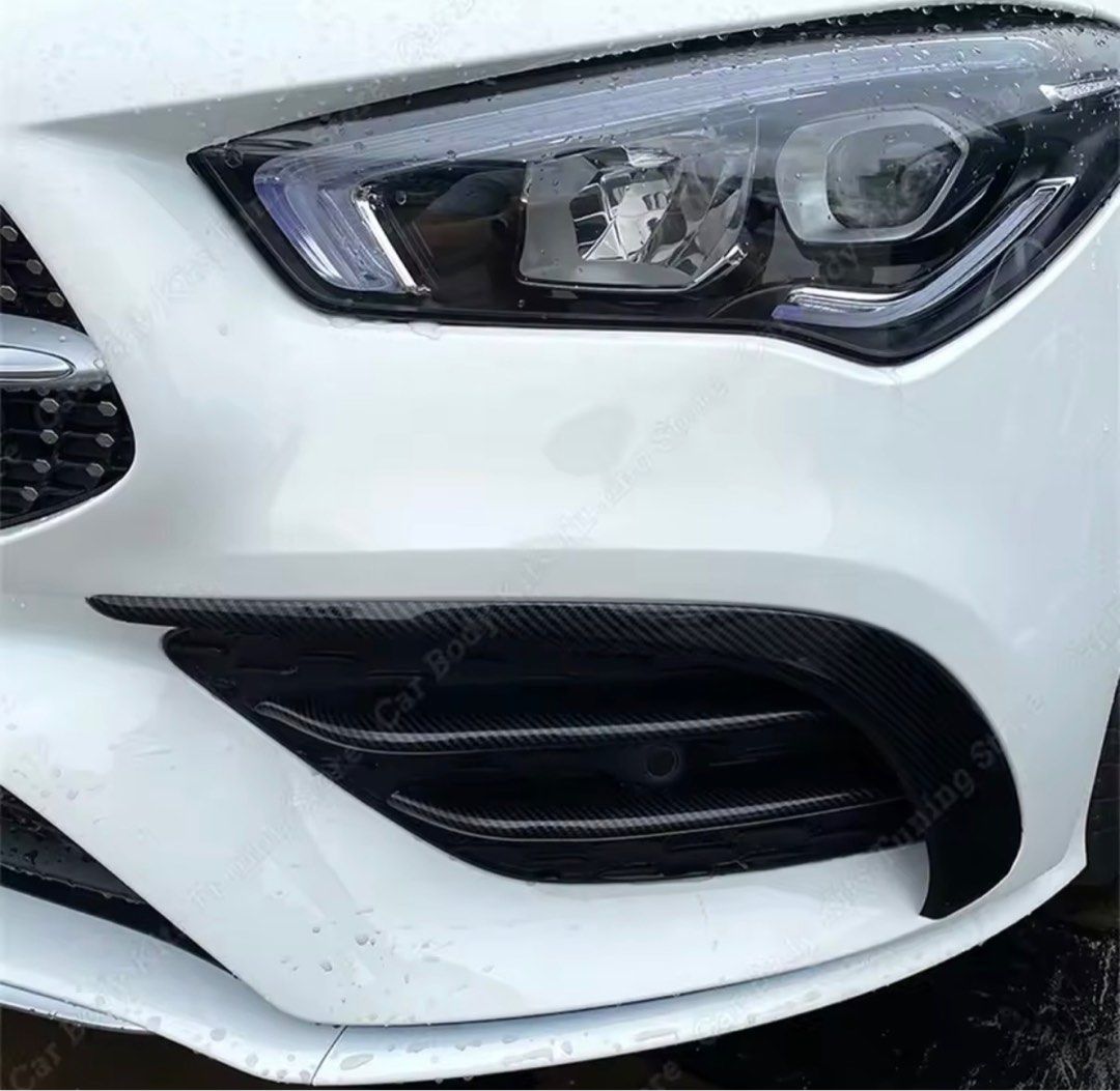 CLA Front Foglight Trim Gloss Black Brand New 2019-2022 (Category: Bodykits & Styling) located in Singapore. Submitted by laureay (Listing ID 1416826970, Image 2). Description: Instock, bought extra accidentally. Fits CLA180, 200, 220, 250 2019 to 2022. Comes with 3M tape already on it. Simple stick on installation, clean the surface before sticking. C118 X118 Front Bumper Spoiler Splitter Air Vent Fog Lamp Grill Grille Trim for Mercedes Benz. .