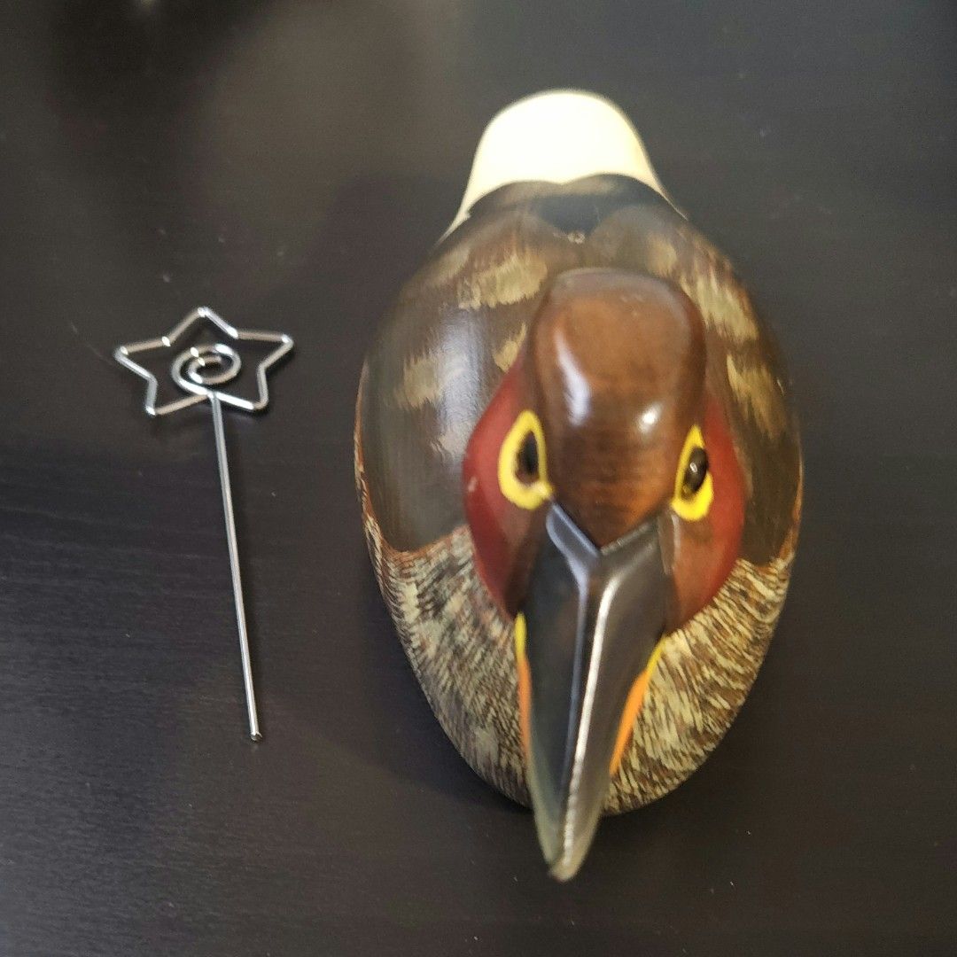 Vintage Hand-Carved Wooden Duck Figurine with Card Holder (Category: Vintage Collectibles) located in Singapore. Submitted by yummiv (Listing ID 1417722689, Image 8). Description: - Vintage hand-carved duck figurine - Intricate hand-painted details - Card holder for photos/notes - Perfect for desk or shelf display.