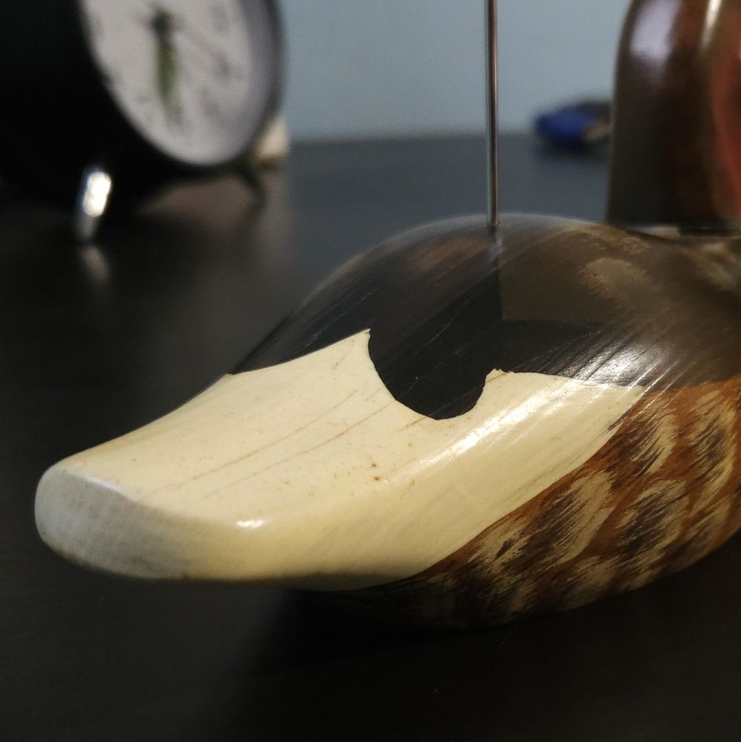 Vintage Hand-Carved Wooden Duck Figurine with Card Holder (Category: Vintage Collectibles) located in Singapore. Submitted by yummiv (Listing ID 1417722689, Image 3). Description: - Vintage hand-carved duck figurine - Intricate hand-painted details - Card holder for photos/notes - Perfect for desk or shelf display.